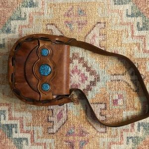 - Vintage leather and turquoise shoulder bag!